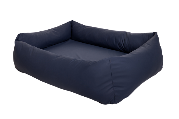 Ein Hundebett der Serie PULMACELL support von MEDI-TECH auf dem ein brauner vor weißem Hintergrund